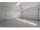 Spacious garage with an automatic door and extra storage at 19014 W Ocotillo Rd, Waddell, AZ 85355