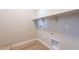 Laundry area with shelving and hookups at 19014 W Ocotillo Rd, Waddell, AZ 85355