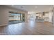 Spacious living room with sliding glass doors leading to the backyard at 19014 W Ocotillo Rd, Waddell, AZ 85355
