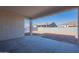 Covered patio with access to backyard at 19014 W Ocotillo Rd, Waddell, AZ 85355