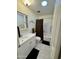 Bright bathroom with a vanity, a combination shower and tub, and tiled floors at 10931 W Peoria Ave, Sun City, AZ 85351