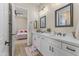 Double vanity bathroom with modern finishes and a bright interior at 18223 W Rancho Ct, Litchfield Park, AZ 85340