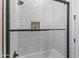 Clean bathroom with white subway tile walk-in shower at 18223 W Rancho Ct, Litchfield Park, AZ 85340