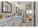 Double vanity bathroom with modern finishes and a bright interior at 18223 W Rancho Ct, Litchfield Park, AZ 85340