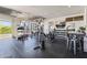 Well-equipped home gym featuring various machines and weights at 18223 W Rancho Ct, Litchfield Park, AZ 85340