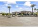 House front showcasing a stone facade and nicely landscaped walkway at 18223 W Rancho Ct, Litchfield Park, AZ 85340