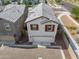 Aerial view of a stylish home, with a durable tile roof, red shutters, and a convenient two-car garage at 3930 S 58Th Ln, Phoenix, AZ 85043