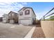 Modern two-story home featuring a spacious garage and neat landscaping, set in a desirable neighborhood at 3930 S 58Th Ln, Phoenix, AZ 85043