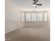 Spacious bedroom featuring carpet, a ceiling fan, and plantation shutters at 9301 E Desert Arroyos --, Scottsdale, AZ 85255