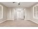 Bright bedroom with neutral walls, carpet, shuttered windows and modern ceiling fan at 9301 E Desert Arroyos --, Scottsdale, AZ 85255