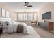 Serene main bedroom with a plush bed, modern decor, and a ceiling fan at 9301 E Desert Arroyos --, Scottsdale, AZ 85255