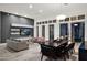 Spacious living and dining area with modern design, natural light, and comfortable seating at 13778 E Charter Oak Dr, Scottsdale, AZ 85259
