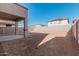 New construction home with a large backyard and covered patio at 18428 W Poston Dr, Surprise, AZ 85387