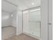 Modern bathroom with a large walk-in shower at 18428 W Poston Dr, Surprise, AZ 85387