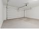 Spacious garage with automatic door opener and ample storage space at 18428 W Poston Dr, Surprise, AZ 85387