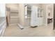 Organized walk-in closet with shelving and drawers, offering ample storage and easy access to belongings at 11301 N Northfield St, Surprise, AZ 85388