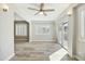 Sunlit dining area with sliding doors to backyard at 14535 W Zuni Trl, Surprise, AZ 85374