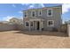 New construction home featuring a spacious backyard and back patio with views of the community at 36378 W San Alvarez Ave, Maricopa, AZ 85138