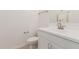 This bathroom offers a white single sink vanity with modern faucet and hardware at 11942 W Parkway Ln, Avondale, AZ 85323