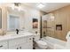 Stylish bathroom with sleek white vanity, tub-shower combo, and modern fixtures at 3059 E Rose Ln, Phoenix, AZ 85016
