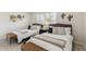 Inviting bedroom with two beds, natural light, and desert-themed decor at 3059 E Rose Ln, Phoenix, AZ 85016