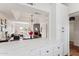 Bright living space featuring an open concept kitchen and a large living room at 3059 E Rose Ln, Phoenix, AZ 85016