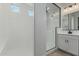 Bathroom featuring walk-in shower with white subway tile and black trim at 11950 W Parkway Ln, Avondale, AZ 85323