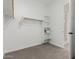 An organized walk-in closet featuring custom shelving and ample storage space at 11950 W Parkway Ln, Avondale, AZ 85323