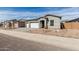 Attractive one-story home with a well-maintained yard and convenient three-car garage at 11950 W Parkway Ln, Avondale, AZ 85323