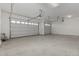 Spacious three car garage featuring ample space for parking and storage at 11950 W Parkway Ln, Avondale, AZ 85323