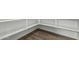 Pantry includes shelves for storage, and stylish vinyl flooring that enhances both functionality and aesthetics at 11950 W Parkway Ln, Avondale, AZ 85323