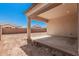 Covered back patio with ample space for entertaining, ideal for outdoor dining and relaxation at 12007 W Parkway Ln, Avondale, AZ 85323