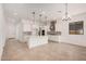 Spacious, open-concept kitchen with a center island and modern appliances at 12007 W Parkway Ln, Avondale, AZ 85323