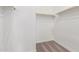 A walk-in closet featuring carpet and ample storage space at 12012 W Parkway Ln, Avondale, AZ 85323