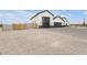 View of the exterior of the home, showcasing attached garages, desert landscaping and block wall at 32278 N 168Th Ave, Surprise, AZ 85387