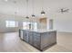 Open-concept kitchen featuring a central island, stainless steel appliances, and sleek cabinetry at 32278 N 168Th Ave, Surprise, AZ 85387