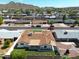 Charming single-story home featuring a well-maintained lawn, a brown roof, and mountain views at 2236 E Blanche Dr, Phoenix, AZ 85022