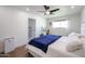 Serene main bedroom with a plush bed and ensuite bath and vanity area at 2236 E Blanche Dr, Phoenix, AZ 85022