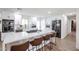 Bright kitchen featuring white cabinetry, a large center island, and stainless steel appliances at 2236 E Blanche Dr, Phoenix, AZ 85022