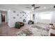 Open-concept living room with lots of natural light, modern furniture, and wood floors at 2236 E Blanche Dr, Phoenix, AZ 85022