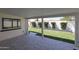 Covered patio area overlooking a well-maintained backyard with mature landscaping at 2236 E Blanche Dr, Phoenix, AZ 85022
