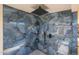 Close-up of outdoor shower featuring rain shower head and wall-mounted toiletries at 2236 E Blanche Dr, Phoenix, AZ 85022