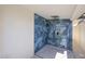 Outdoor shower featuring elegant blue tiling and modern fixtures at 2236 E Blanche Dr, Phoenix, AZ 85022