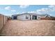 Spacious backyard with a view of the home's back elevation at 22886 E Alyssa Rd, Queen Creek, AZ 85142