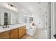 Elegant bathroom with double vanity, soaking tub, and walk-in shower at 22886 E Alyssa Rd, Queen Creek, AZ 85142