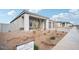 New home with a modern design and neatly landscaped front yard at 22886 E Alyssa Rd, Queen Creek, AZ 85142