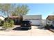 Charming home featuring a well-maintained front yard and two-car garage at 6313 W Onyx Ave, Glendale, AZ 85302