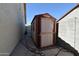 Exterior view of the backyard storage shed, providing practical storage solutions at 6313 W Onyx Ave, Glendale, AZ 85302