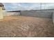 Large backyard with block wall and plenty of space for landscaping at 9987 W Verde Ln, Avondale, AZ 85392