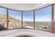 Panoramic mountain and city views from a large window at 5676 E Cheney Dr, Paradise Valley, AZ 85253